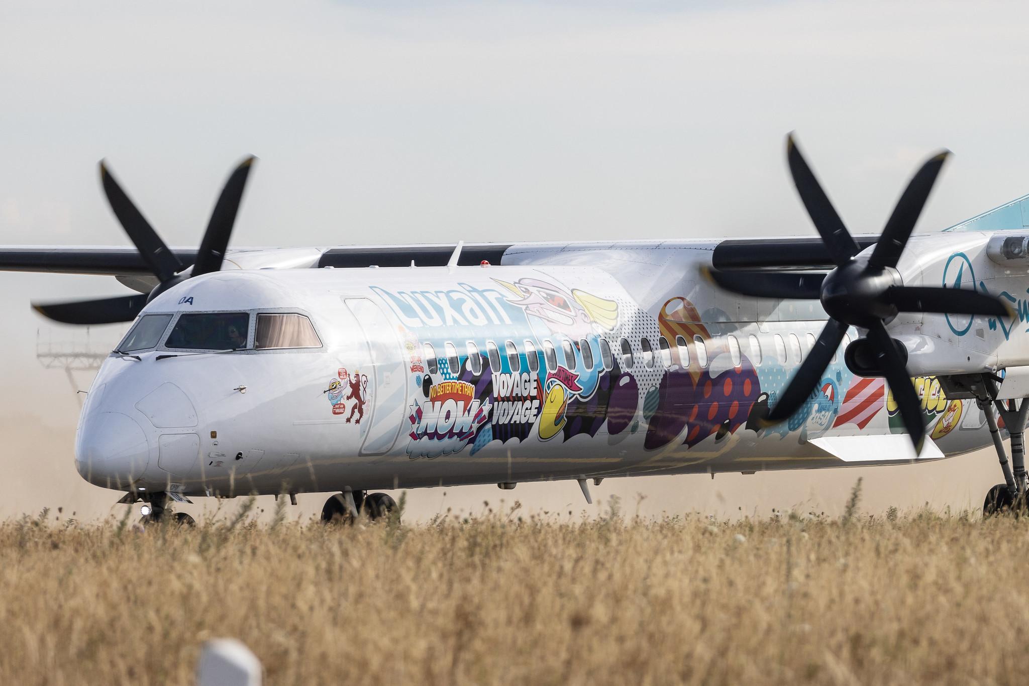 Luxembourg Findel Airport: Luxair (LG / LGL) | Livery: Sumo Artwork's Livery | De Havilland Canada Dash 8-400 DH8D | LX-LQA | MSN 4468